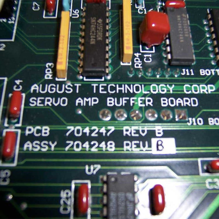 Close-up of a circuit board with electronic components and text