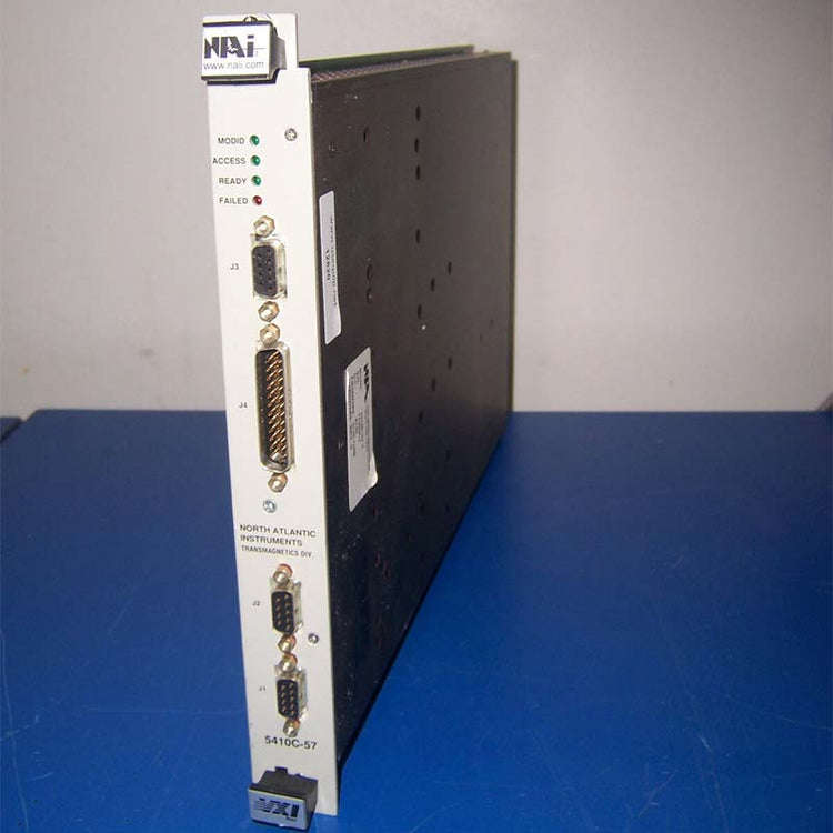 Electronic module with multiple connectors on a blue surface