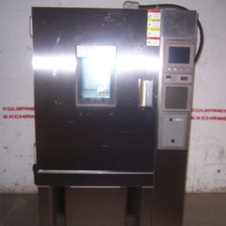 used cold temperature and humidity chamber with a control panel on a white background