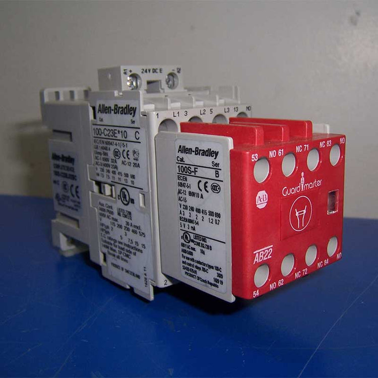 Allen-Bradley relay on a blue surface with a gray background