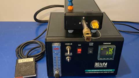 beahm hot air station equipment with digital display and control panel on a blue surface