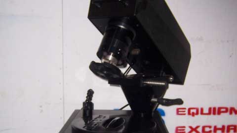 Black mechanical component on a white background with 'US Equipment Exchange' branding.