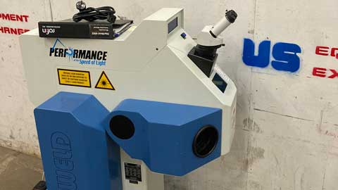 performance laser welder with 'Performance' branding on a concrete wall background