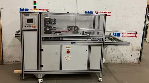 Steeger USA braiding machine with 'US Equipment' branding in a warehouse setting